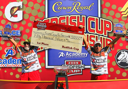 Father-son Broussard team collect $50,000 check for redfish win